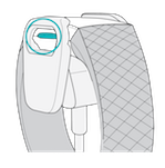 Tracker in the charging clip with the button highlighted
